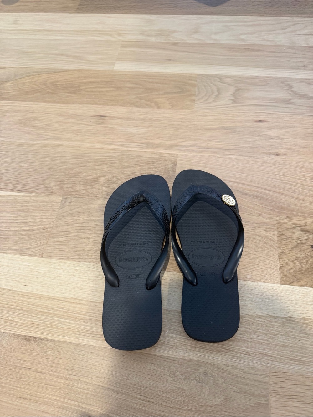 Havaianas Black Slim Flip Flops with Gold Charm